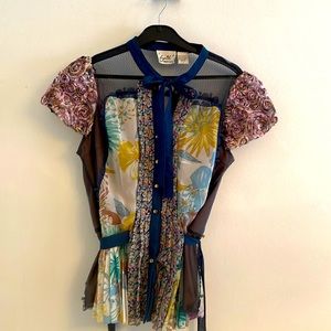 This Anthropologie top has a lovely floral design.